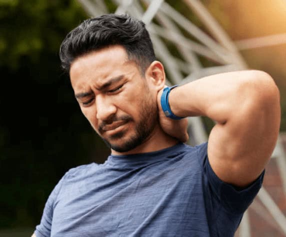 Man experiencing neck pain. 